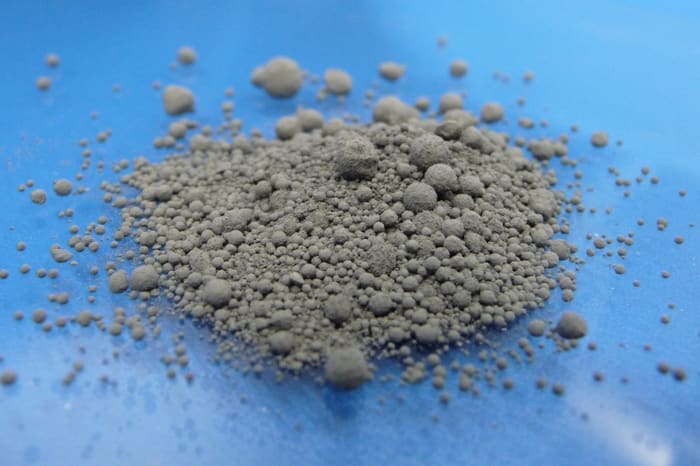 A mound of grey coal fly ash powder