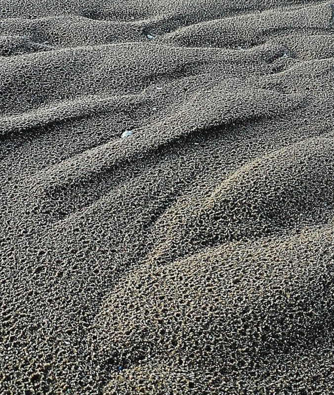 Fine dark washed sand in ridges